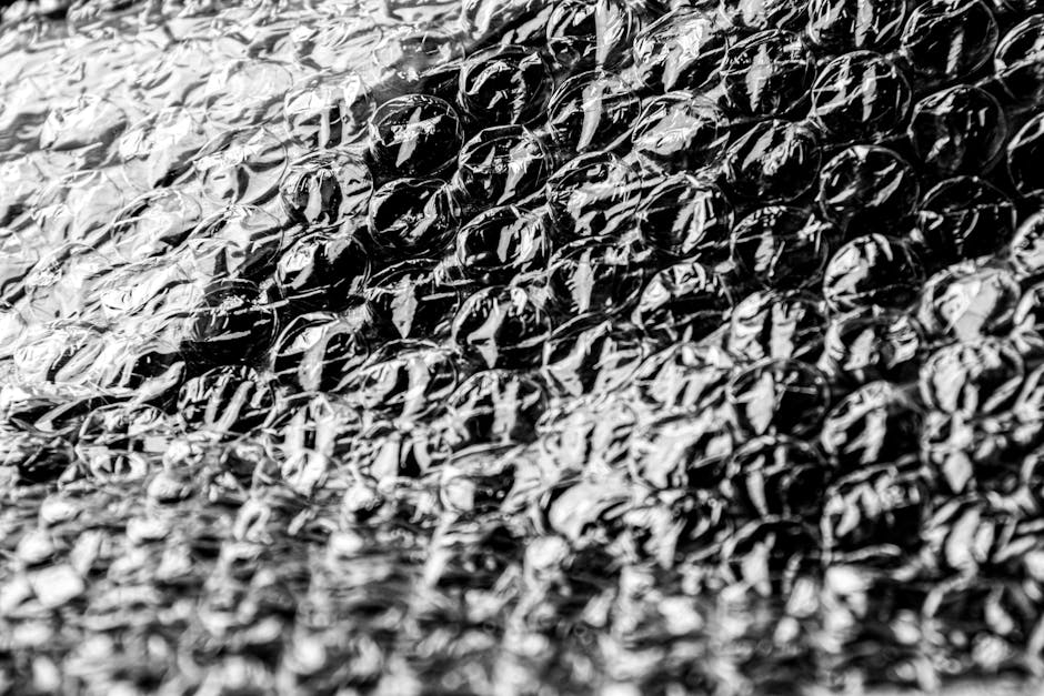 Close-up of bubble wrap texture — each air-filled bubble creates a thermal barrier that adds approximately R-1 insulation value to single-pane windows