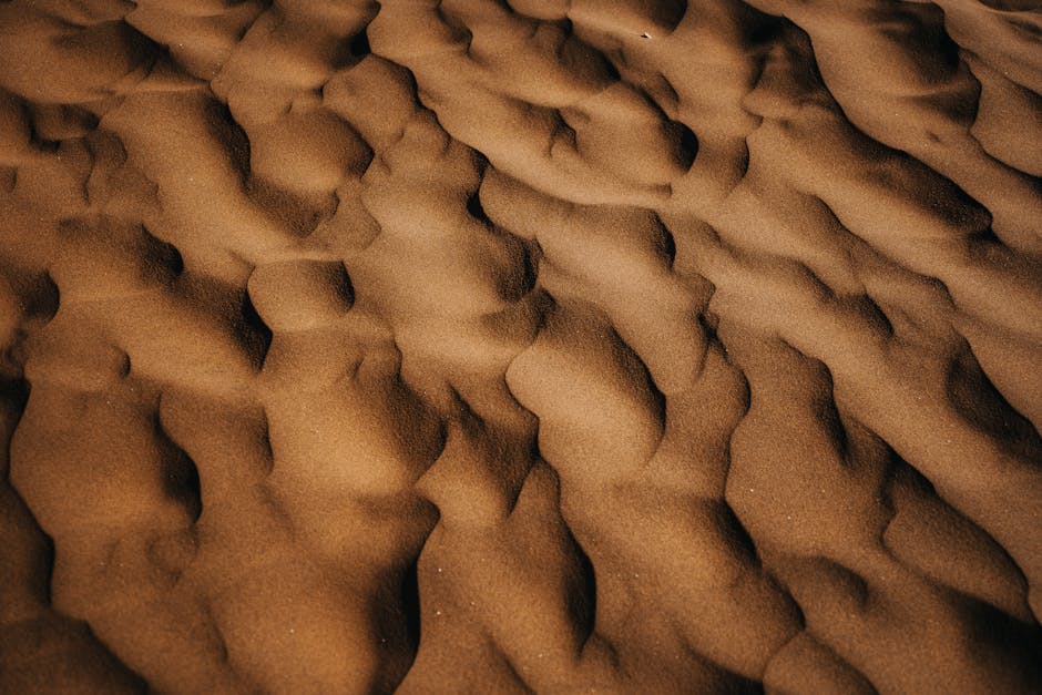 Close-up of dry sand grains - the main material in a DIY sand battery thermal heat storage system