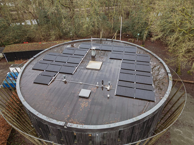 Solar thermal storage system with insulated water tank for home heating — the cheapest way to store solar energy without batteries