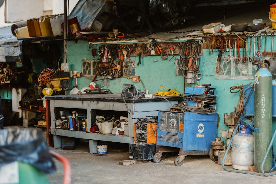 Workshop garage interior with tools on wall — solar powered heating keeps garage workspaces comfortable in winter without grid electricity costs